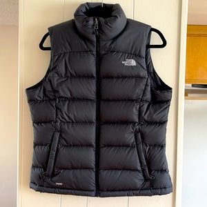 The North Face down vest. Size medium. Never worn.